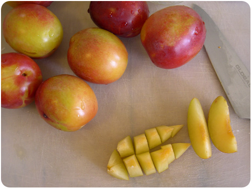 slicing and chopping plums