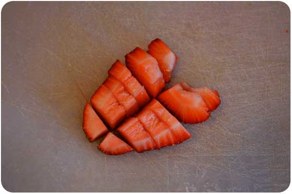 preparing strawberries for the infusion chopped strawberries