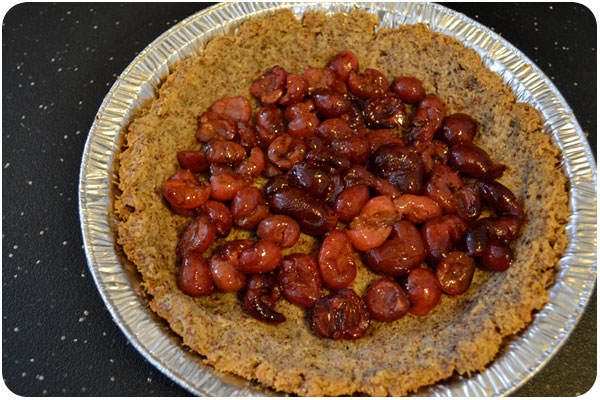 roasted cherries line the pie crust